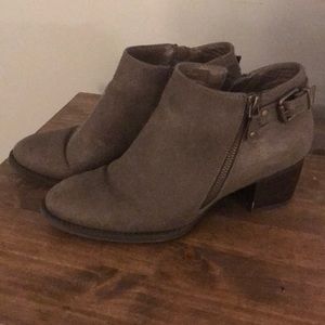 Brown zipper heeled booties with buckle